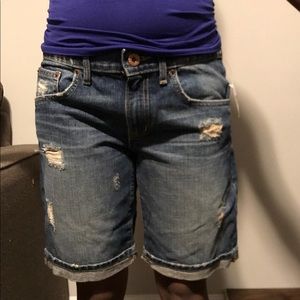 Distressed/ deconstructed denim shorts